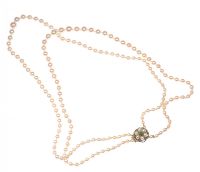 DOUBLE ROW OF GRADUATED CULTURED PEARLS WITH PEARL CLASP (REQUIRES REPAIR) at Ross's Online Art Auctions