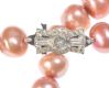 STRING OF ROSE PINK FRESH WATER CULTURED PEARLS WITH STERLING SILVER AND DIAMANT CLASP at Ross's Online Art Auctions