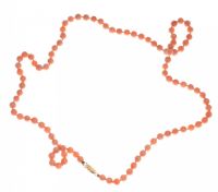 STRING OF KNOTTED CORAL BEADS WITH 14CT GOLD CLASP at Ross's Online Art Auctions