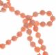 STRING OF KNOTTED CORAL BEADS WITH 14CT GOLD CLASP at Ross's Online Art Auctions