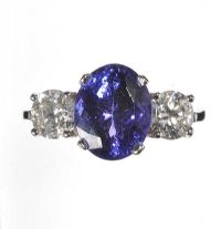 18CT WHITE GOLD TANZANITE AND DIAMOND THREE STONE RING at Ross's Online Art Auctions