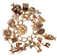 9CT GOLD CHARM BRACELET WITH HEART-SHAPED PADLOCK CLASP at Ross's Online Art Auctions