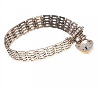 STERLING SILVER GATE LINK BRACELET WITH HEART-SHAPED PADLOCK CLASP at Ross's Online Art Auctions