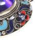 SILVER AND ENAMEL CLOISONN PENDANT SET WITH PURPLE GLASS at Ross's Online Art Auctions