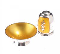STERLING SILVER AND YELLOW ENAMEL SALT AND PEPPER SET at Ross's Online Art Auctions