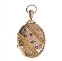 VICTORIAN ENGRAVED 9CT GOLD LOCKET SET WITH RUBIES AND SEED PEARLS at Ross's Online Art Auctions