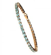 9CT GOLD AND BLUE APATITE LINE BRACELET at Ross's Online Art Auctions