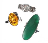 SELECTION OF THREE SILVER RINGS, ONE SET WITH AMBER AND ONE SET WITH MALACHITE at Ross's Online Art Auctions