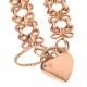 9CT ROSE GOLD BOW-LINK BRACELET WITH HEART-SHAPED CLASP at Ross's Online Art Auctions