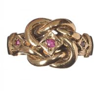 9CT GOLD AND RUBY KNOT RING at Ross's Online Art Auctions