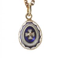 RUSSIAN ENAMELED 15CT GOLD EGG PENDANT WITH 9CT GOLD CHAIN at Ross's Online Art Auctions