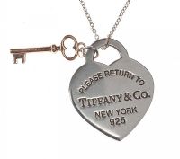 TIFFANY & CO. STERLING SILVER HEART PENDANT AND CHAIN WITH KEY CHARM AND BOX at Ross's Online Art Auctions