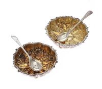 PAIR OF EMBOSSED SILVER SALTS & SPOONS at Ross's Online Art Auctions