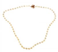 STRING OF CULTURED PEARLS WITH 9CT GOLD AND GARNET CLASP at Ross's Online Art Auctions