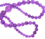 STRING OF GRADUATED PURPLE JADE BEADS WITH A SILVER CLASP at Ross's Online Art Auctions
