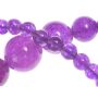 STRING OF GRADUATED PURPLE JADE BEADS WITH A SILVER CLASP at Ross's Online Art Auctions
