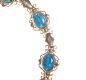 9CT GOLD AND BLUE TOPAZ BRACELET at Ross's Online Art Auctions