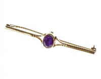 9CT GOLD AND AMETHYST BAR BROOCH at Ross's Online Art Auctions