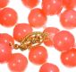 CORAL BEADED NECKLACE WITH GOLD PLATED CLASP at Ross's Online Art Auctions