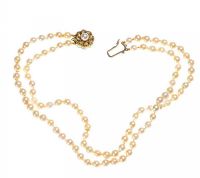 DOUBLE STRING OF CULTURED PEARLS WITH 9CT GOLD CLASP at Ross's Online Art Auctions