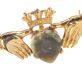 GOLD METAL AND CONNEMARA MARBLE CLADDAGH BAR BROOCH at Ross's Online Art Auctions