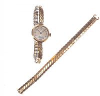 RECORD 9CT GOLD CASED LADY'S WRIST WATCH WITH GOLD PLATED BRACELET at Ross's Online Art Auctions