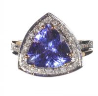 LORIQUE 18CT GOLD TANZANITE AND DIAMOND RING at Ross's Online Art Auctions