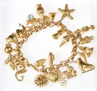 9CT GOLD CHARM BRACELET WITH 27 ASSORTED CHARMS at Ross's Online Art Auctions
