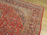 LARGE RED & BLUE PERSIAN RUG at Ross's Online Art Auctions