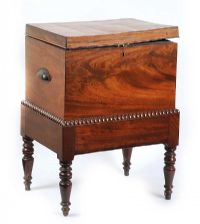 GEORGIAN MAHOGANY CELLARETTE RAISED ON TURNED LEGS  THE TOP HAS BECOME WARPED at Ross's Online Art Auctions