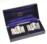 TWO SILVER NAPKIN RINGS IN BOX, T.HAKENJAS, DUNDALK LONDON 1915-1916 at Ross's Online Art Auctions