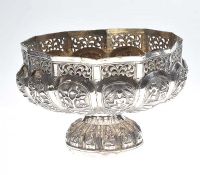EMBOSSED INDIAN SILVER CIRCULAR BOWL WITH PIERCED BORDER ON A CIRCULAR FOOT at Ross's Online Art Auctions