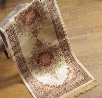 CASHMERE RUNNER WITH GEOMETRIC FLORAL PATTERN ON CREAM GROUND at Ross's Online Art Auctions