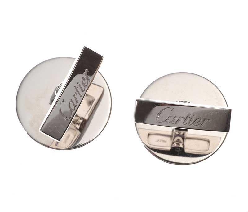 Double C de Cartier cufflinks with Stamp motif in silver and blue lacquer.