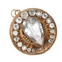 GOLD-TONE METAL AND CRYSTAL PENDANT at Ross's Online Art Auctions