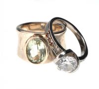 TWO SILVER AND CRYSTAL-SET RINGS at Ross's Online Art Auctions