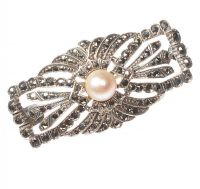 SILVER PIERCED BROOCH SET WITH MARCASITE AND A CULTURED PEARL at Ross's Online Art Auctions
