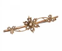 9CT GOLD BAR BROOCH IN A FLORAL DESIGN SET WITH SEED PEARLS IN ANTIQUE BOX at Ross's Online Art Auctions