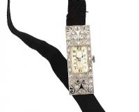 ANTIQUE PLATINUM AND DIAMOND-SET LADY'S COCKTAIL WATCH WITH BLACK GROSGRAIN RIBBON at Ross's Online Art Auctions