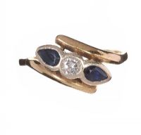18CT GOLD SAPPHIRE AND DIAMOND CROSSOVER RING at Ross's Online Art Auctions
