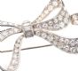 1950'S PLATINUM AND DIAMOND BOW BROOCH at Ross's Online Art Auctions