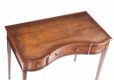 SERPENTINE FRONT WRITING DESK at Ross's Online Art Auctions