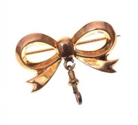 9CT GOLD BOW BROOCH at Ross's Online Art Auctions
