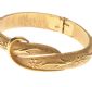 TEXTURED GOLD-TONE METAL BANGLE BY THE DESIGNER TRIFARI at Ross's Online Art Auctions