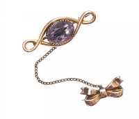 VICTORIAN 9CT GOLD BOW AMETHYST BROOCH at Ross's Online Art Auctions