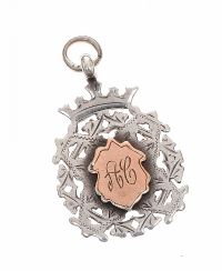 STERLING SILVER SHIELD PENDANT WITH ROSE-GOLD GILT at Ross's Online Art Auctions