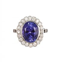 18CT WHITE GOLD TANZANITE AND DIAMOND CLUSTER RING at Ross's Online Art Auctions