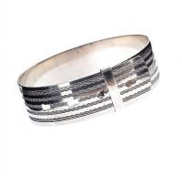 ANTIQUE STERLING SILVER ENGRAVED BANGLE DESIGNED AS A BELT at Ross's Online Art Auctions