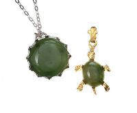 STERLING SILVER AND 9CT GOLD JADE-SET PENDANTS, ON A STERLING SILVER CHAIN at Ross's Online Art Auctions