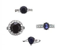 FOUR GEM-SET STERLING SILVER RINGS at Ross's Online Art Auctions